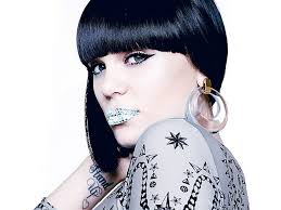 Jessie j hasn't shared the meaning behind her xo tattoo yet, but it is pulling double duty, covering up a tattoo of a tiny. Hd Wallpaper Jessie J Singers One Person Young Adult Portrait Tattoo Wallpaper Flare