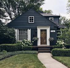It is a traditional choice, and not necessarily exciting, but it can make your home look crisp and sophisticated. Dark Blue Houses