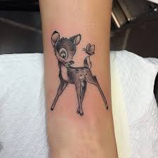74 likes · 1 talking about this. Grey Ink Bambi Deer Tattoo On Arm