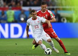 Xherdan shaqiri؛ مواليد 10 أكتوبر 1991) هو لاعب كرة قدم سويسري يلعب في مركز الوسط مع نادي ليفربول في الدوري الإنجليزي الممتاز ومنتخب سويسرا لكرة القدم. Ø´Ø§ÙƒÙŠØ±Ù‰ ÙˆØªØ´Ø§ÙƒØ§ ÙŠ Ø´Ø¹Ù„Ø§Ù† Ø£Ø²Ù…Ø© Ø³ÙŠØ§Ø³ÙŠØ© Ø¨Ø³Ø¨Ø¨ Ø§Ø­ØªÙØ§Ù„ Ø§Ù„Ù†Ø³Ø± Ø§Ù„Ù…ØµØ±ÙŠ Ø§Ù„ÙŠÙˆÙ…