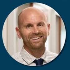 Dr. Travis Baumann, MD