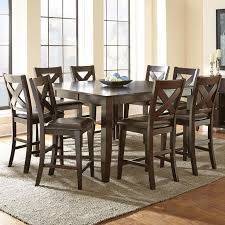 Featuring a spacious table (with room enough to seat eight people!) each of these sets is designed to make sharing meals a breeze. Steve Silver Crosspointe 9 Piece Counter Height Dining Set With 18 Leaf Walker S Furniture Pub Table And Stool Sets