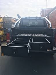 With iphone and android devices users, you can also apply those steps for in order to schedule your pickup, you have two choices based on the shipping label condition of the order. Volkswagen Amarok With Gearmate 226mm Twin Drawers Infill Pods And Tailgate Gap Flap Volkswagenamarok Truck Bed Storage Tonneau Cover Trailer Accessories
