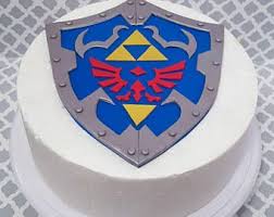 Breath of the wild, series creator shigeru. Zelda Link Hylian Shield Edible Fondant Cake Topper Zelda Birthday Zelda Cake Fondant Cake Topper