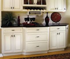 off white cabinets with black kitchen
