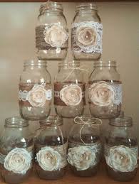 These Rustic Mason Jar Ideas Are Great For Barn Yard Wedding These Wedding Decorations A Lace Mason Jars Mason Jar Decorations Wedding Centerpieces Mason Jars