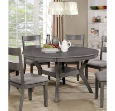 Featuring clean lines, this table is easy on the eyes with its roughhewn wood surface and natural textures that add stylish charm. Juniper Gray Wood Round Dining Table By Furniture Of America