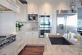 A stone effect tile is a brilliant compromise for those who want a maintenance free kitchen floor but still love the look of a natural stone. Timeless Kitchens Ltd Timeless Kitchen Design Ideas Aha Daily