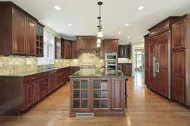 Combining wood floors with wood cabinets can be challening. 43 Kitchens With Extensive Dark Wood Throughout Light Wood Cabinets Light Wood Floors Cherry Cabinets Kitchen