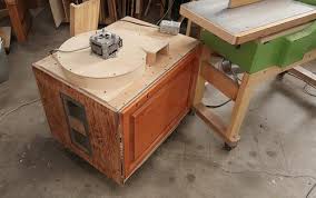 I got tired of lugging a big shop vac around my workshop whenever i used the table saw. A Dust Collector For The Table Saw