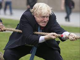 British prime minister boris johnson greets german chancellor angela merkel ahead a bilateral meeting saturday during the group of seven summit in cornwall, england.stefan rousseau. Boris Johnson S Favourite Pastime Is To Play Tug Of War Over His Swimming Pool George Osborne Reveals