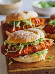 To build the sandwiches, toss the lettuce with a spoonful of the mayo. Baked Honey Hot Chicken Sandwiches Spoon Fork Bacon