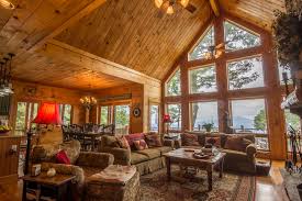 The classic log cabin great room includes a soaring cathedral ceiling, an open floor plan, and a massive stone fireplace. Innspiration Boone 4 Bedroom Pet Friendly Cabin Rental Near Appalachian State University 69452 Find Rentals