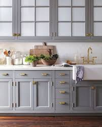 Gray kitchen cabinets | kitchen cabinets were the center of your kitchen that takes half of the whole space and cost you the most out of other furniture. Look We Love Gray Kitchen Cabinets With Brass Hardware Grey Kitchen Cabinets Kitchen Cabinet Design Blue Gray Kitchen Cabinets