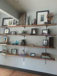 Easy Diy Shelves For Craft Room Instead Of Buying Book Shelves Hang Rows Of Separate Shelves Home Depot Has Them Alre Craft Room Shelves Diy Shelves Shelves