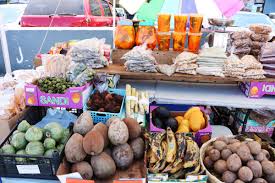 El salvador flag on fresh vegetables and plate of salvadoran enchiladas on background. What To Buy And Eat At La S Salvadoran Street Food Market Eater La