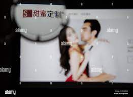 A Chinese netizen browses the dating website SeekingArrangement (SA) for  people seeking 