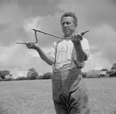 At 20 to 30 feet from where the water comes to or near the ground's surface, by holding the wire (bent on a 90 degree angle) i get a magnetic attraction to the point of the start of the water vein. Water Dowsing