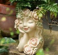 Amazon.com: Togestar Jardinera decorativa con cabeza de hada ...