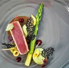Waiter serving a chicken dish. Stunning Presentation Food Plating Fancy Food Presentation Food Presentation