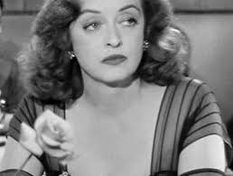 Noel Coward Gives Good Dame in “Blithe Spirit”