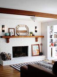 Renovating a tired, dated fireplace is one of those things—it can seem like the project is way too difficult or time consuming to do right. Best Painted Brick Walls Domino Brick Fireplace Makeover White Brick Fireplace Painted Brick Walls