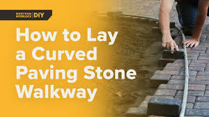A paver walkway can add an attractive touch to your landscape. How To Lay A Curved Paving Stone Walkway Youtube