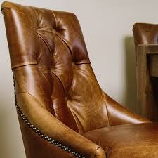 The v alpin series in reclaimed oak stands out with its design originality. Leather Dining Chair Leather Button Back Chair Curiosity Interiors