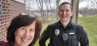 GPD officers during shift change, taking temps and stocking up