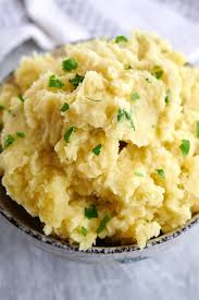 This easy mashed potatoes recipe is perfect for the holiday season and pairs well with just about everything. Garlic Mashed Potatoes Easy Mashed Potatoes Recipe Using Buttery Yukon Gold Potatoes Garlic Mashed Potato Recipes Garlic Red Mashed Potatoes Potato Recipes