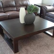 Clean lines and a lightly distressed finish make a. Watson Coffee Table Ashley Furniture Homestore Coffee Table Coffee Table Wood Oversized Coffee Table
