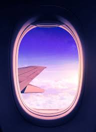 Travel The World Magical View From An Airplane Window With The Sun Glowing Over The Clouds And The Star Fi Airplane Window Airplane Photography Travel Posters