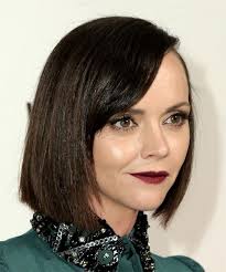 A hairstyle with stylishly side swept bang will make you look very harmonious. Christina Ricci Medium Straight Black Bob Haircut With Side Swept Bangs