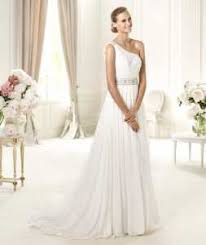 Looking like a grecian goddess in your wedding gown does not mean you have to spend money like the gods (the greek gods probably spent a ton of money, right?). Grecian Inspired Wedding Dress Bridal Village Dress Designers