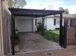 Flat Outback Carport With Alpine Colour Roofing All Type Roofing Metal Carports Carport Home Exterior Makeover