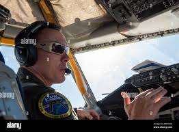 U.S. Air Force Capt. Jared Smithson, 909th Air Refueling Squadron pilot,  speaks to his co-pilot mid-flight over the Pacific Ocean, Jan. 10, 2023.  Aircrews routinely fly missions aimed at sharpening the necessary