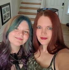 Mystery novel with female writer and cabin setting?