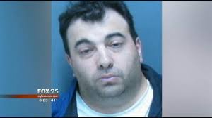 Former hockey player says Coach DeSilva 'crawled into his bed'