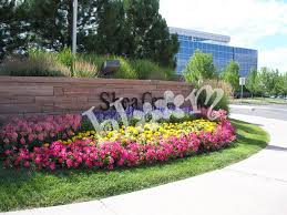 Pin By Bloom Floralscapes On Annual Flowers Landscaping Entrance Commercial Landscape Design Annual Plants