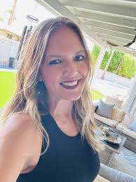 Woman thriving after abusive marriage