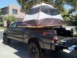 My Solution To The Roof Top Tent Debate More Options Less Money Truck Bed Tent Roof Top Tent Diy Roof Top Tent