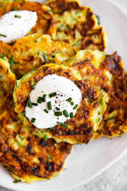 Combine all of your ingredients in a medium mixing bowl. Easy Zucchini Fritters Recipe Savory Nothings