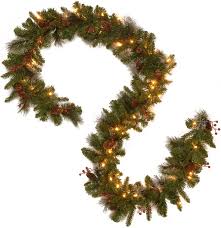 I personalized mine with more lights, some gold balls and ribbon and is it even the holidays if there isn't garland hung all around your home? Amazon Com National Tree Company Pre Lit Artificial Christmas Garland Flocked With Mixed Decorations And Led Lights Crestwood Spruce 9ft Home Kitchen