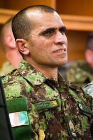 Afghan Sgt. Maj. of the Army Roshan Safi listens to