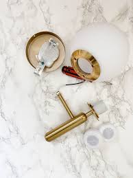 Removing the current light fixture use the mounting bracket from the new light fixture. How To Install Wall Sconces Or Light Fixtures Without Hardwiring Or A Wall Outlet City Chic Decor