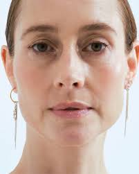 Trio of hoop and stud earrings with marquis crystal, spring ring and f