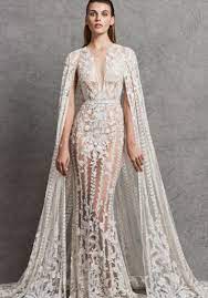 The wedding blog for the sophisticated bride. Zuhair Murad Cyndi Fully Embellished Wedding Dress With Cape Designer Bridal Room