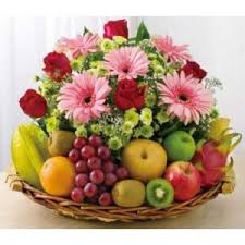 The austerity associated with flowers in a basket is alluring. Fruit Flowers Basket 75 99 Same Day Delivery Giftbasketconnection Fruit Flower Basket Fruit Basket Gift Fruit Flowers