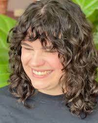 Bangs, bangs, bangs! (or “fringe, fringe, fringe if you're fancy!” 😆)  There are so many different styles out there: curly, micro, curtain, shag,  straight across, 80s, etc. They can also be controversial?