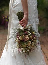 Whether you're inspired by the elegant victorian age, the roaring '20s or the retro '70s, a vintage wedding theme can take your guests back in time and simultaneously bring your favorite era to life.to plan a vintage wedding, first identify the decade or time period that you want to emulate. Dried Flower Bridal Bouquet Vintage Bouquet Brides Bouquet Bouquet Ideas Vintage Bouquet Wedding Flower Bouquet Wedding Bride Bouquets